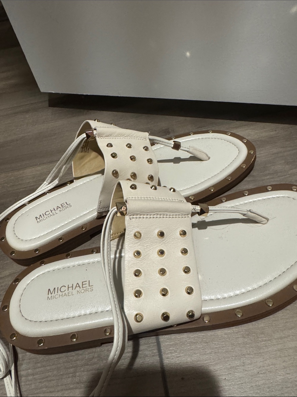 MICHAEL Michael Kors White Leather Studded Thong Sandals with Gold Accents